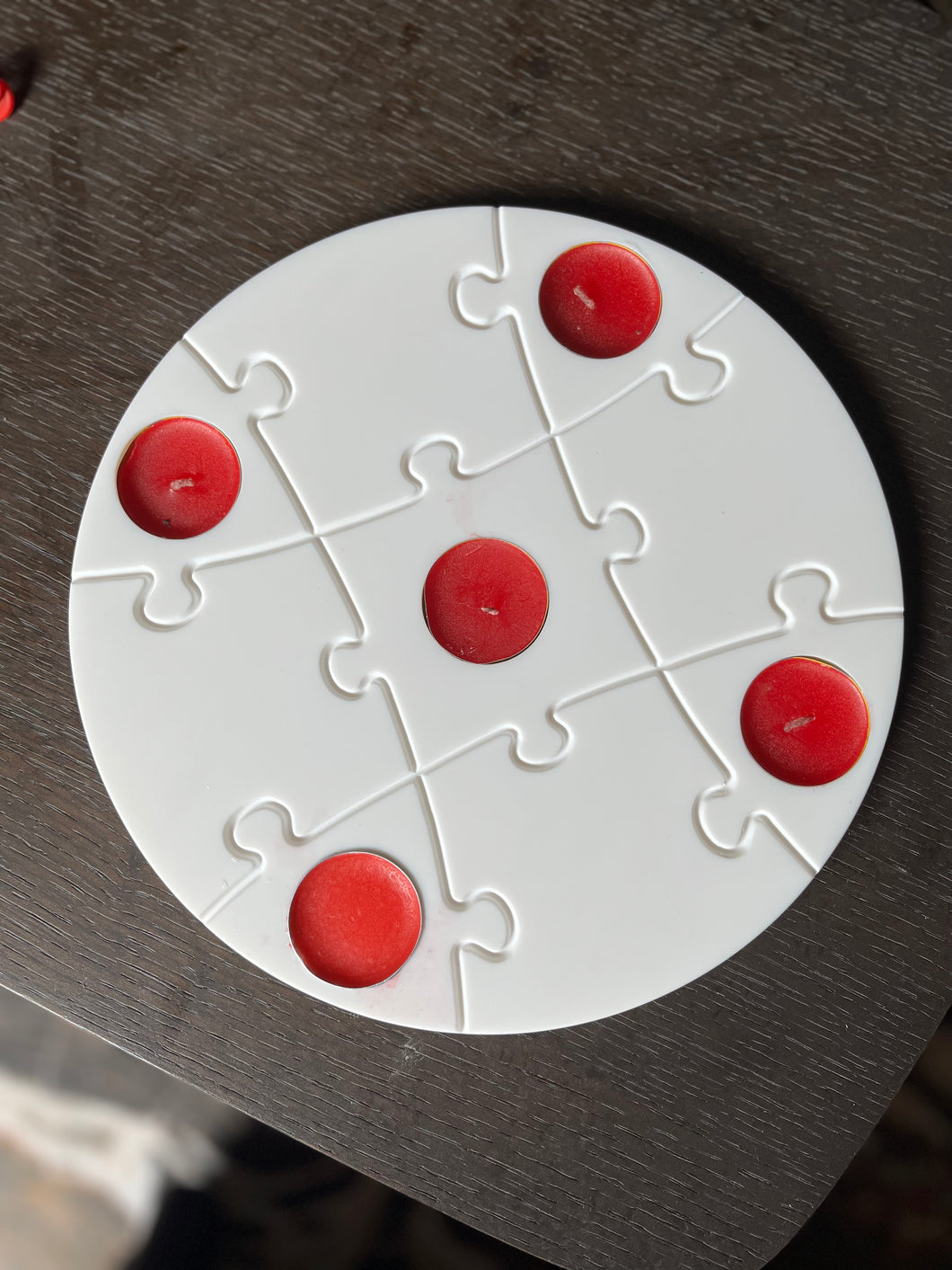 Round puzzle platter with tea lights